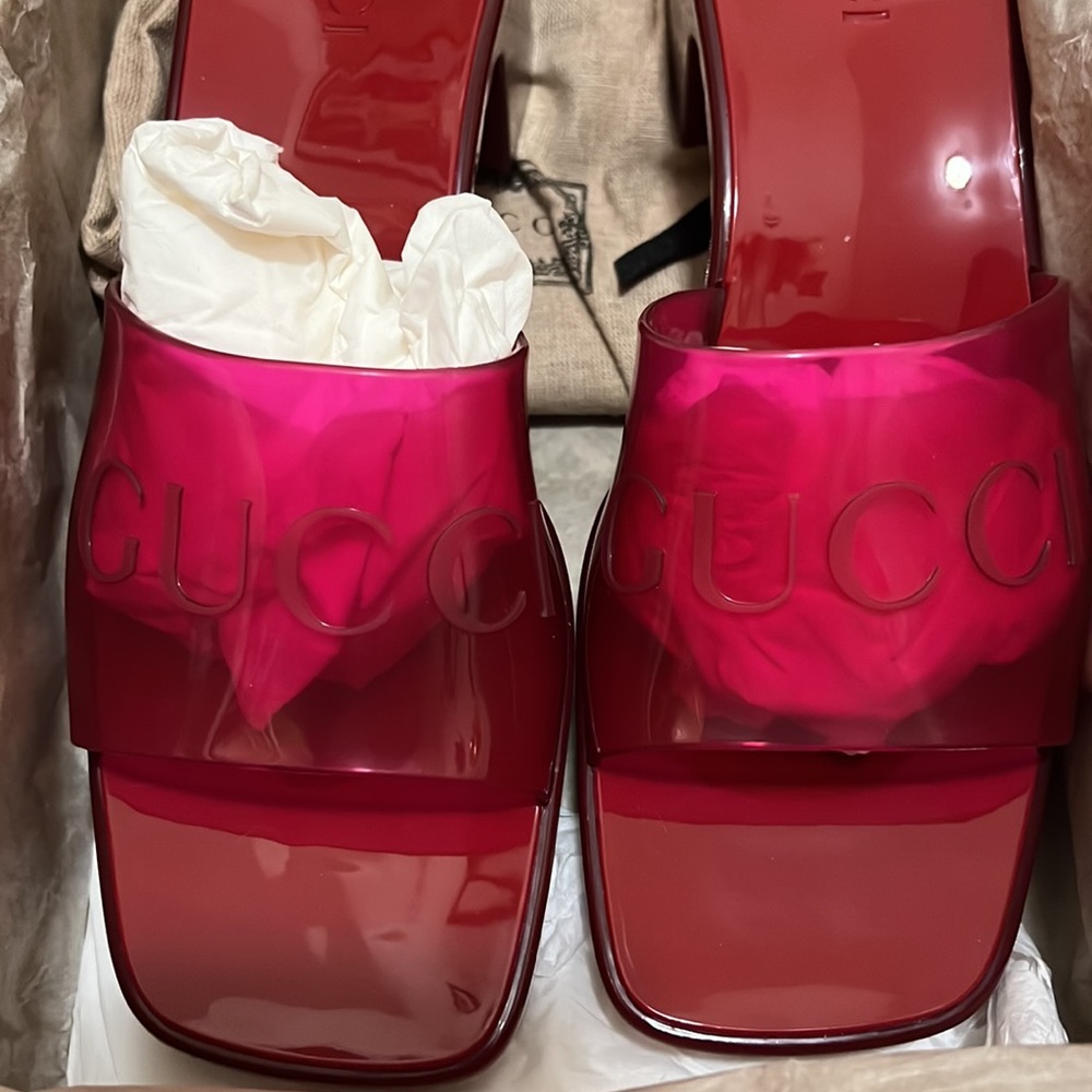 Brand New Gucci translucent red jelly rubber slides.